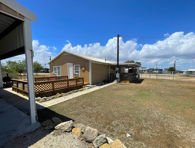 view of yard featuring a deck