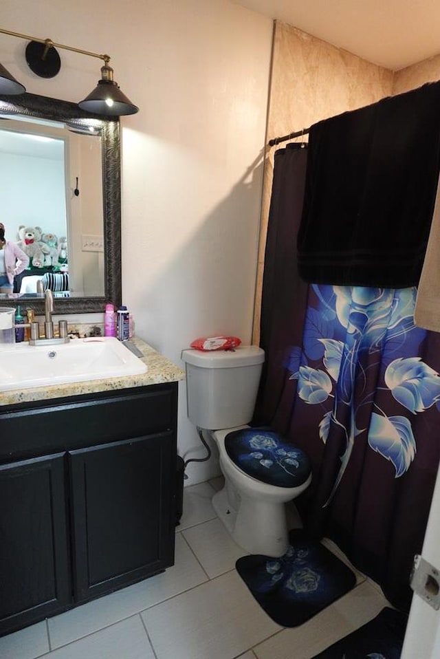 3020 W 15th St, Odessa, TX 79763 - bathroom featuring vanity and tile patterned flooring