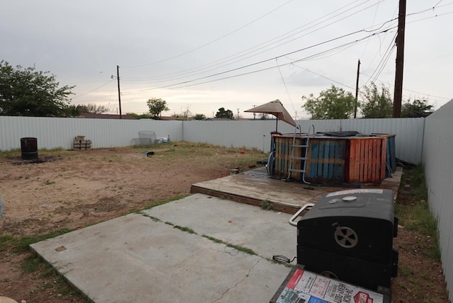 3020 W 15th St, Odessa, TX 79763 - fenced backyard with a patio, a deck, and a pool