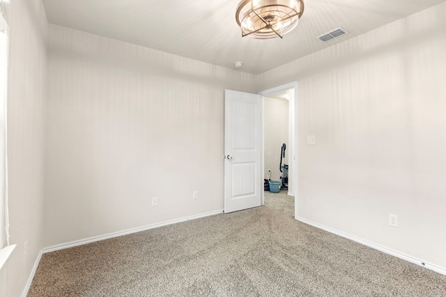 304 E 94th St, Odessa, TX 79765 - empty room featuring carpet and baseboards