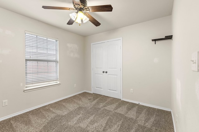 304 E 94th St, Odessa, TX 79765 - unfurnished bedroom with carpet, a closet, and ceiling fan