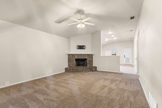 304 E 94th St, Odessa, TX 79765 - unfurnished living room featuring lofted ceiling, ceiling fan, carpet, and a fireplace