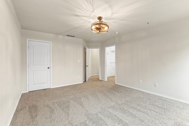 304 E 94th St, Odessa, TX 79765 - empty room featuring light colored carpet and baseboards