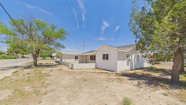 912 W 7th St, Pecos, TX 79772 - view of front of property with stucco siding