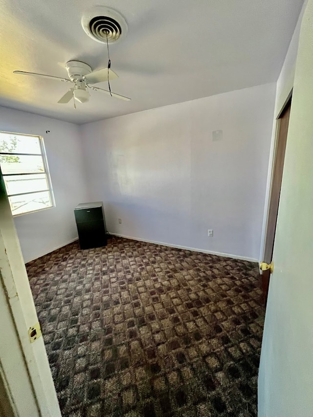3501 Merrill Ave, Odessa, TX 79764 - spare room with carpet floors and ceiling fan