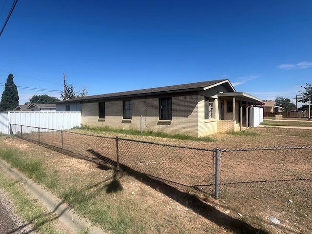 3501 Merrill Ave, Odessa, TX 79764 - view of front of home with brick siding and driveway