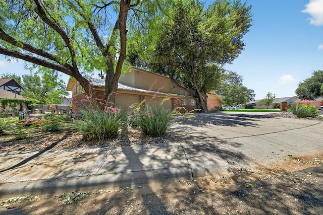 2720 Fair Oaks Cir, Odessa, TX 79762 - view of front facade featuring a garage