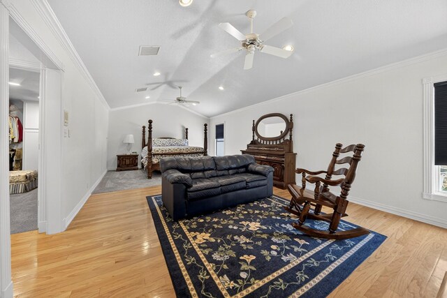 2720 Fair Oaks Cir, Odessa, TX 79762 - living area with vaulted ceiling, light wood-style flooring, ceiling fan, crown molding, and recessed lighting