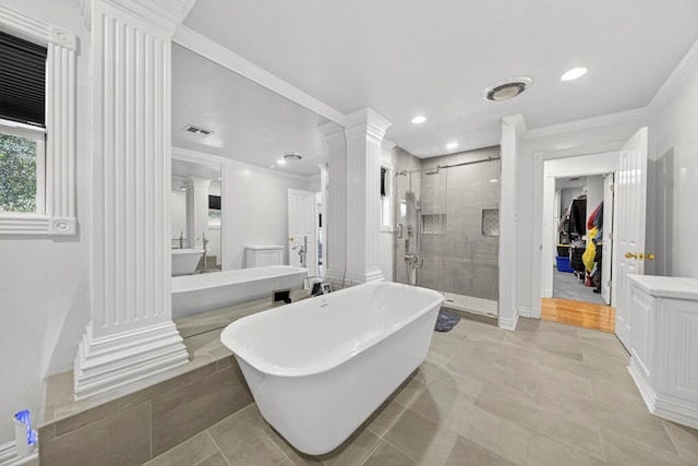 2720 Fair Oaks Cir, Odessa, TX 79762 - full bath with a shower stall, ornate columns, a soaking tub, ornamental molding, and vanity