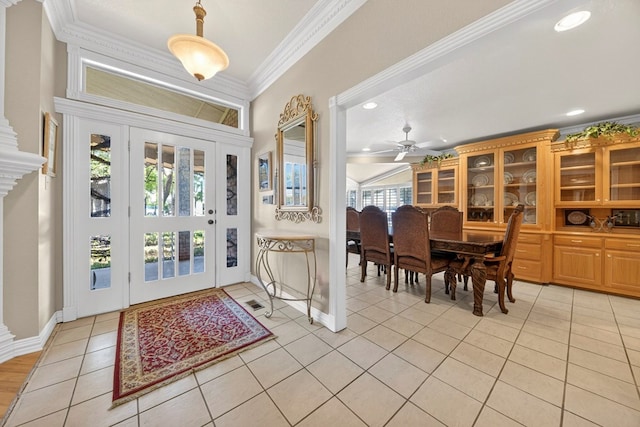 2720 Fair Oaks Cir, Odessa, TX 79762 - foyer entrance featuring crown molding, light tile patterned floors, a ceiling fan, and recessed lighting