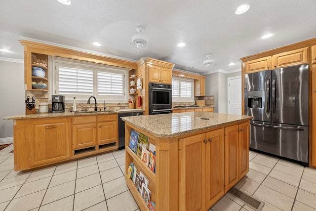 2720 Fair Oaks Cir, Odessa, TX 79762 - kitchen with black appliances, open shelves, crown molding, a center island, and light stone counters