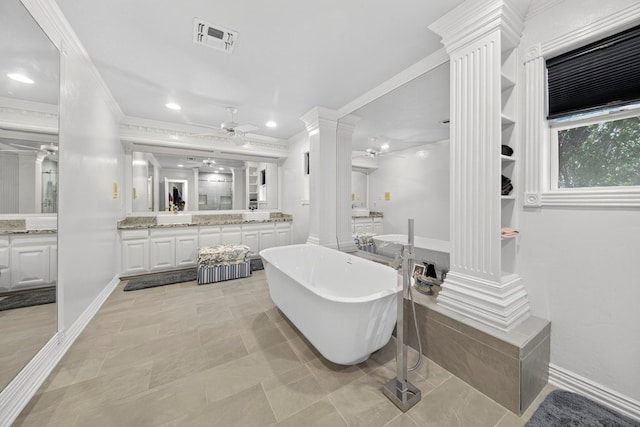 2720 Fair Oaks Cir, Odessa, TX 79762 - bathroom with ornate columns, a soaking tub, a ceiling fan, vanity, and crown molding