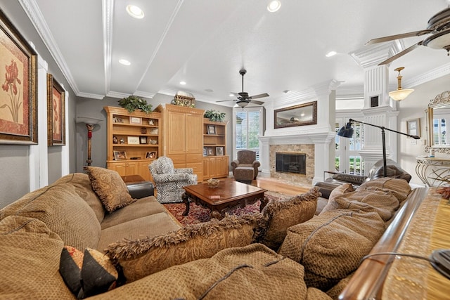 2720 Fair Oaks Cir, Odessa, TX 79762 - living room featuring a ceiling fan, plenty of natural light, ornamental molding, a fireplace, and recessed lighting