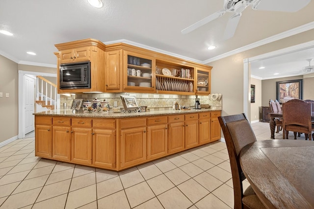 2720 Fair Oaks Cir, Odessa, TX 79762 - kitchen featuring stainless steel microwave, a ceiling fan, light tile patterned flooring, recessed lighting, and tasteful backsplash