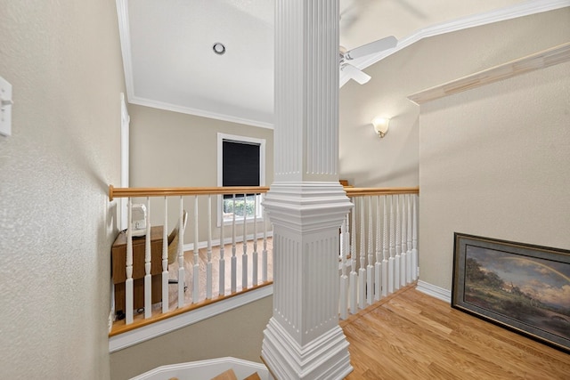 2720 Fair Oaks Cir, Odessa, TX 79762 - stairway with wood finished floors, crown molding, and decorative columns