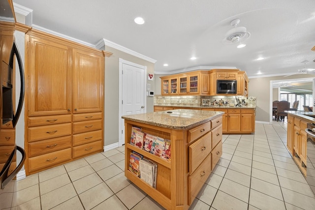 2720 Fair Oaks Cir, Odessa, TX 79762 - kitchen featuring stainless steel microwave, ornamental molding, backsplash, light tile patterned flooring, and recessed lighting