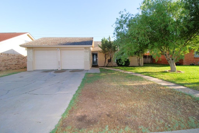 1721 E 56th St, Odessa, TX 79762 - view of front of property with concrete driveway, brick siding, a garage, and a shingled roof