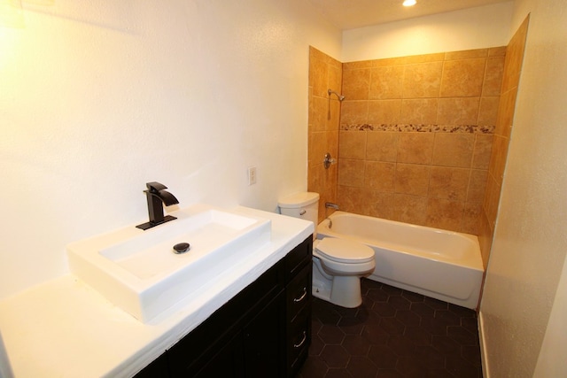 1721 E 56th St, Odessa, TX 79762 - full bath featuring toilet, vanity, shower / washtub combination, and tile patterned flooring