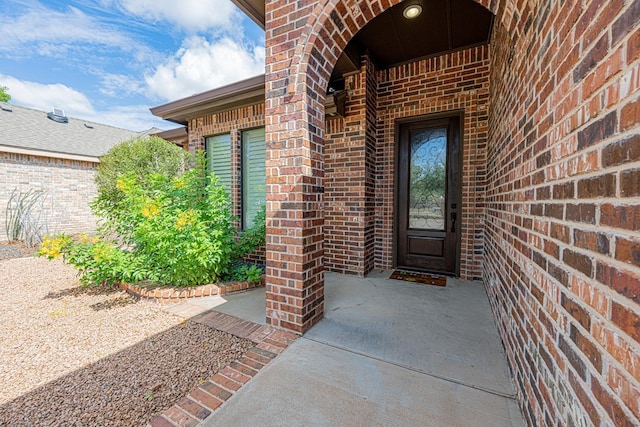 1006 W Cuthbert Ave, Midland, TX 79701 - property entrance with brick siding