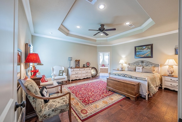 1006 W Cuthbert Ave, Midland, TX 79701 - bedroom with a tray ceiling, ornamental molding, dark wood-type flooring, connected bathroom, and recessed lighting