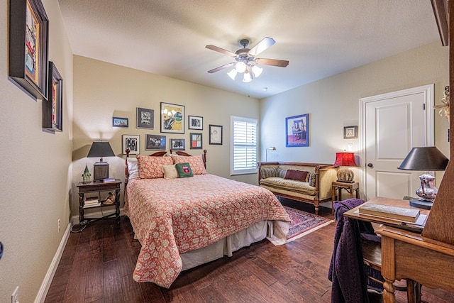 1006 W Cuthbert Ave, Midland, TX 79701 - bedroom with dark wood-style flooring and ceiling fan