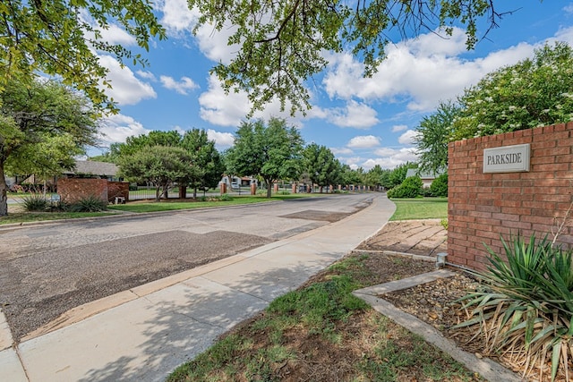 1006 W Cuthbert Ave, Midland, TX 79701 - view of asphalt street with sidewalks and curbs