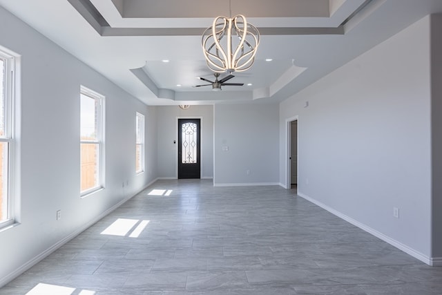 309 S Hancock Ave, Odessa, TX 79761 - entrance foyer with a raised ceiling, a chandelier, ceiling fan, and recessed lighting