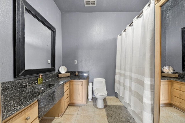 1321 Lindberg St, Odessa, TX 79763 - bathroom with vanity, tile patterned flooring, and a shower with curtain