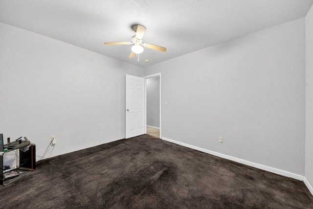 1321 Lindberg St, Odessa, TX 79763 - unfurnished room featuring dark carpet and a ceiling fan