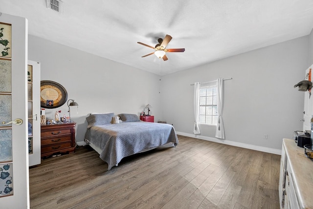 1321 Lindberg St, Odessa, TX 79763 - bedroom with wood finished floors and a ceiling fan