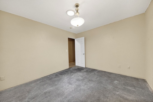 1321 Lindberg St, Odessa, TX 79763 - unfurnished room featuring dark carpet