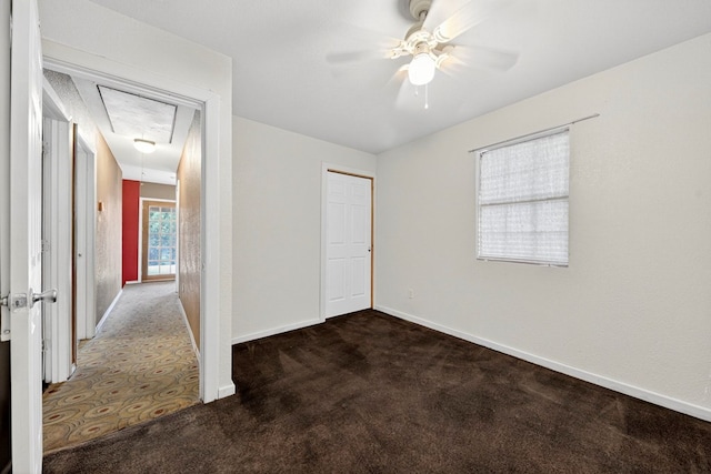 1321 Lindberg St, Odessa, TX 79763 - unfurnished bedroom featuring attic access, carpet flooring, a ceiling fan, and a closet