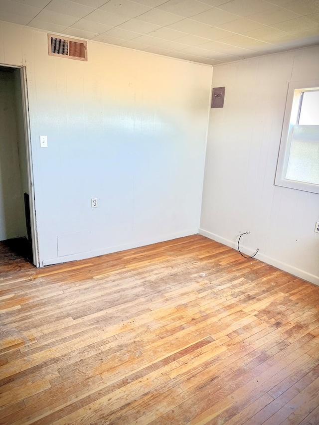 189 County Road 401-l, Seminole, TX 79360 - spare room featuring light wood finished floors and baseboards