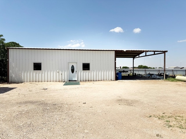 189 County Road 401-l, Seminole, TX 79360 - view of pole building featuring a carport
