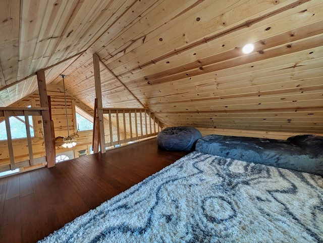 307 Cochise Canyon Trl, Fort Davis, TX 79734 - bedroom with hardwood / wood-style flooring, wooden ceiling, lofted ceiling, and wood walls