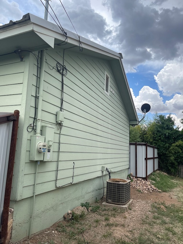 311 S 6th St, Alpine, TX 79830 - view of side of home with a central AC unit