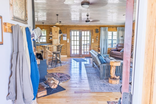 43169 State Highway 17, Fort Davis, TX 79734 - living area with plenty of natural light, wood finished floors, french doors, and a ceiling fan