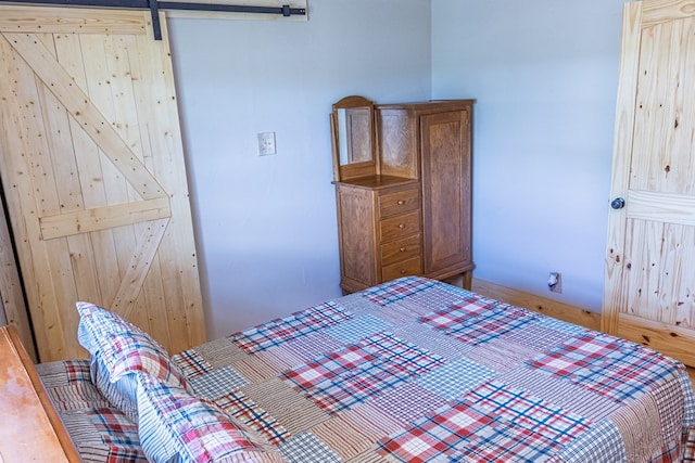 43169 State Highway 17, Fort Davis, TX 79734 - bedroom featuring a barn door