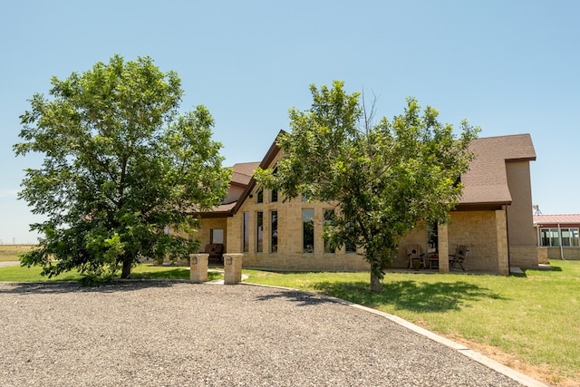 651 Fm 1757, Seminole, TX 79360 - rear view of house with a lawn