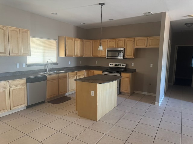 903 W Uvalde Ave, Alpine, TX 79830 - kitchen featuring appliances with stainless steel finishes, light brown cabinets, and recessed lighting