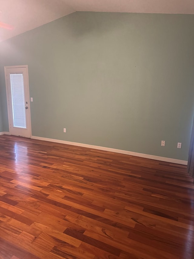 903 W Uvalde Ave, Alpine, TX 79830 - empty room with dark wood-style flooring and lofted ceiling
