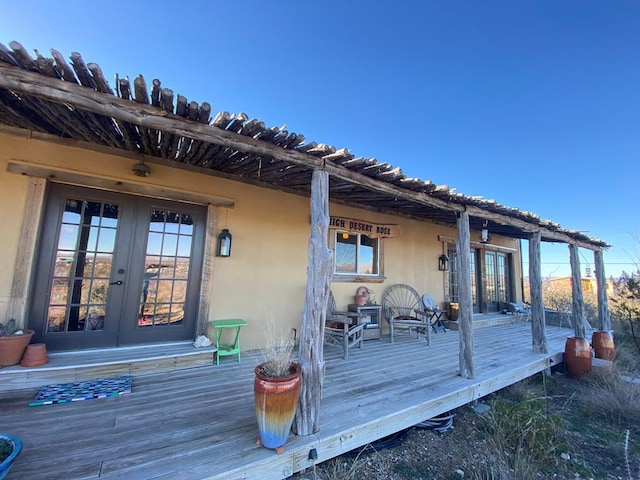 wooden deck with french doors