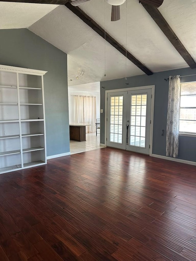 1844 E 50th St, Odessa, TX 79762 - unfurnished living room with french doors, hardwood / wood-style floors, and a ceiling fan