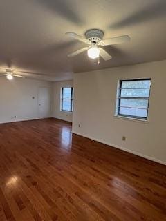 unfurnished room featuring ceiling fan and dark hardwood / wood-style floors