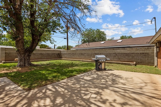 view of patio / terrace featuring a grill and a fenced backyard