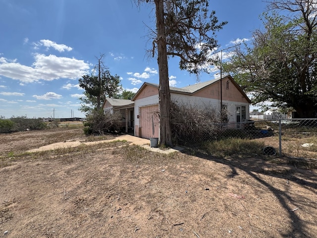300 S Monahans Ave, Wink, TX 79789 - view of home's exterior with a garage