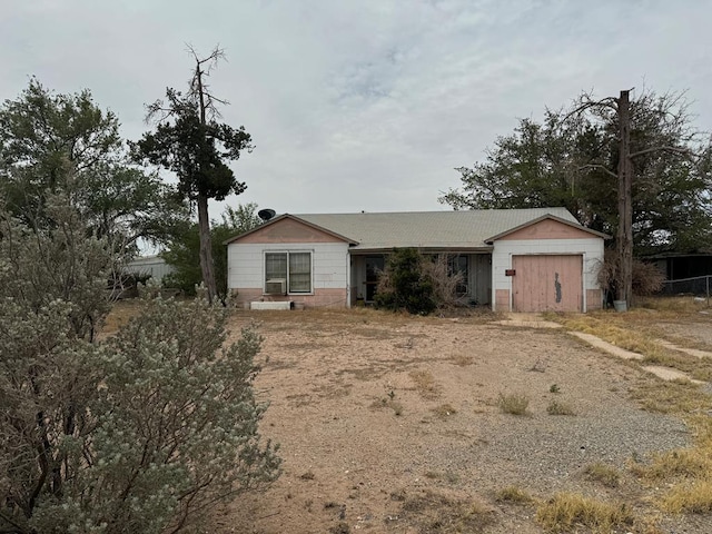 300 S Monahans Ave, Wink, TX 79789 - single story home featuring an attached garage and concrete block siding