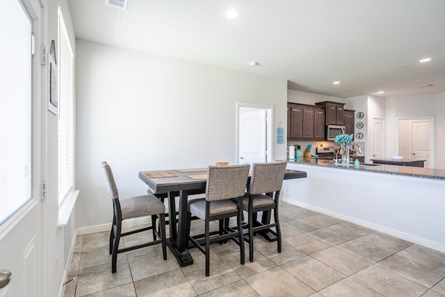 1614 Laguna Meadows Trl, Midland, TX 79705 - dining space featuring recessed lighting and baseboards