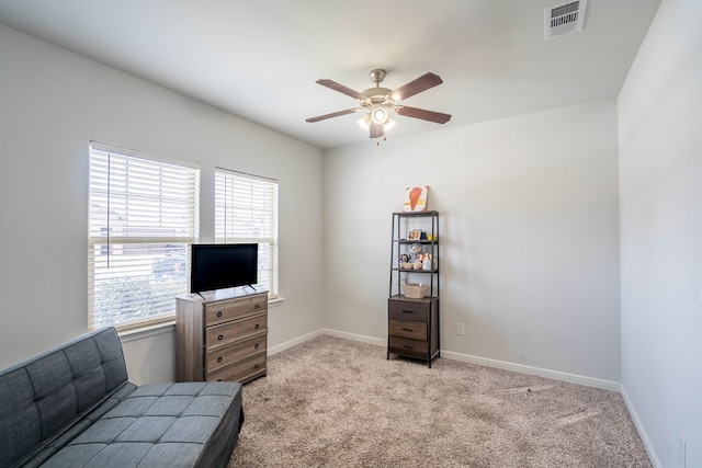 1614 Laguna Meadows Trl, Midland, TX 79705 - living area with ceiling fan and light colored carpet