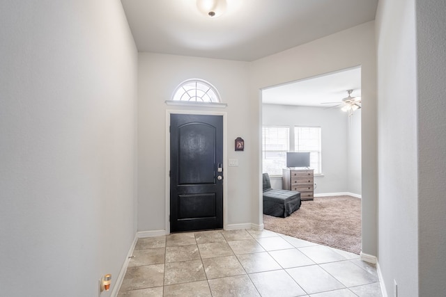1614 Laguna Meadows Trl, Midland, TX 79705 - foyer entrance with ceiling fan, light tile patterned floors, and light carpet